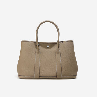 Brigitte – Bolsa Elegante em Couro Genuíno Estilo Togo