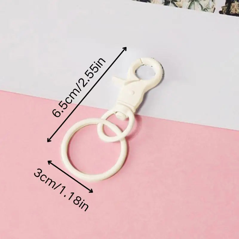 Breloque de sac à main avec pompon fleuri pour femme, porte-clés haut de gamme en cuir PU, pendentif en corde tressée avec pomme de pin et fleur.